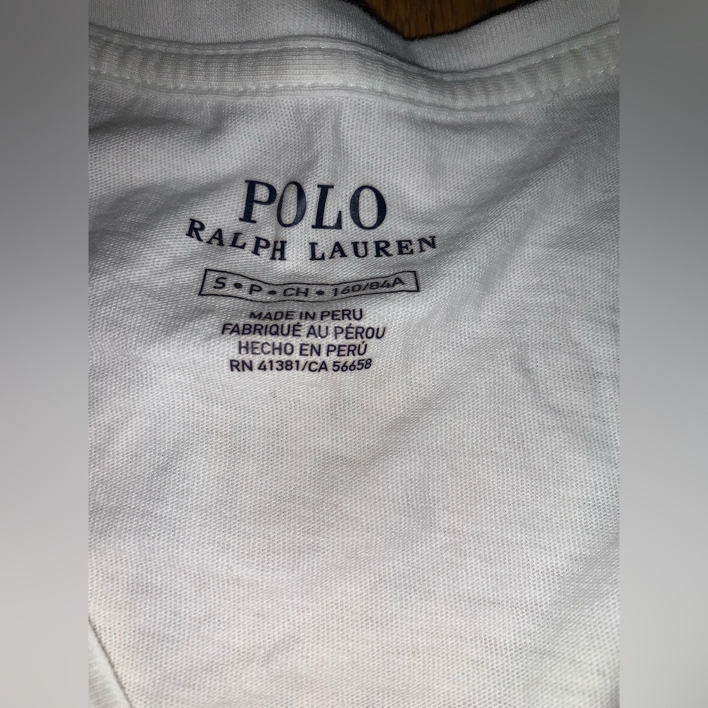 White Polo Short Sleeve T-Shirt with Navy Horse Logo.